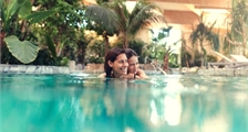 Indoor pool with current at Center Parcs Terhills Resort